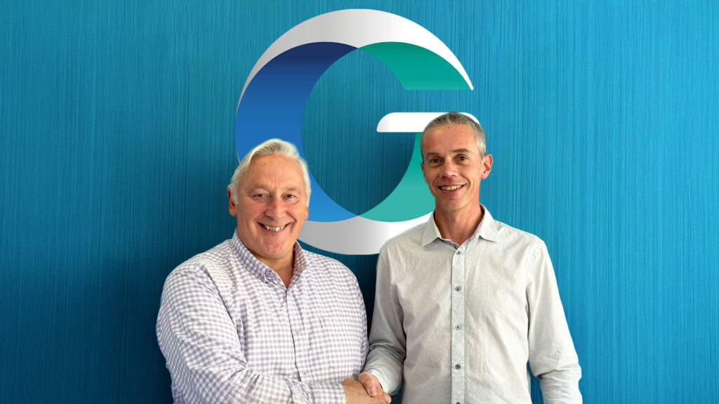 A photo of Paul Fearn, CEO of Geospatial Insight, and Dave Fox, Chairman shaking hands, with the logo in the background.